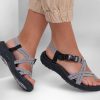 SKECHERS Reggae - Irie Mon Black / White Sandals